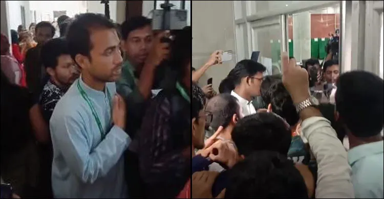 ভোট কেন্দ্রে ঢোকার চেষ্টা  করে ছাত্রদলের প্রর্থীরা।