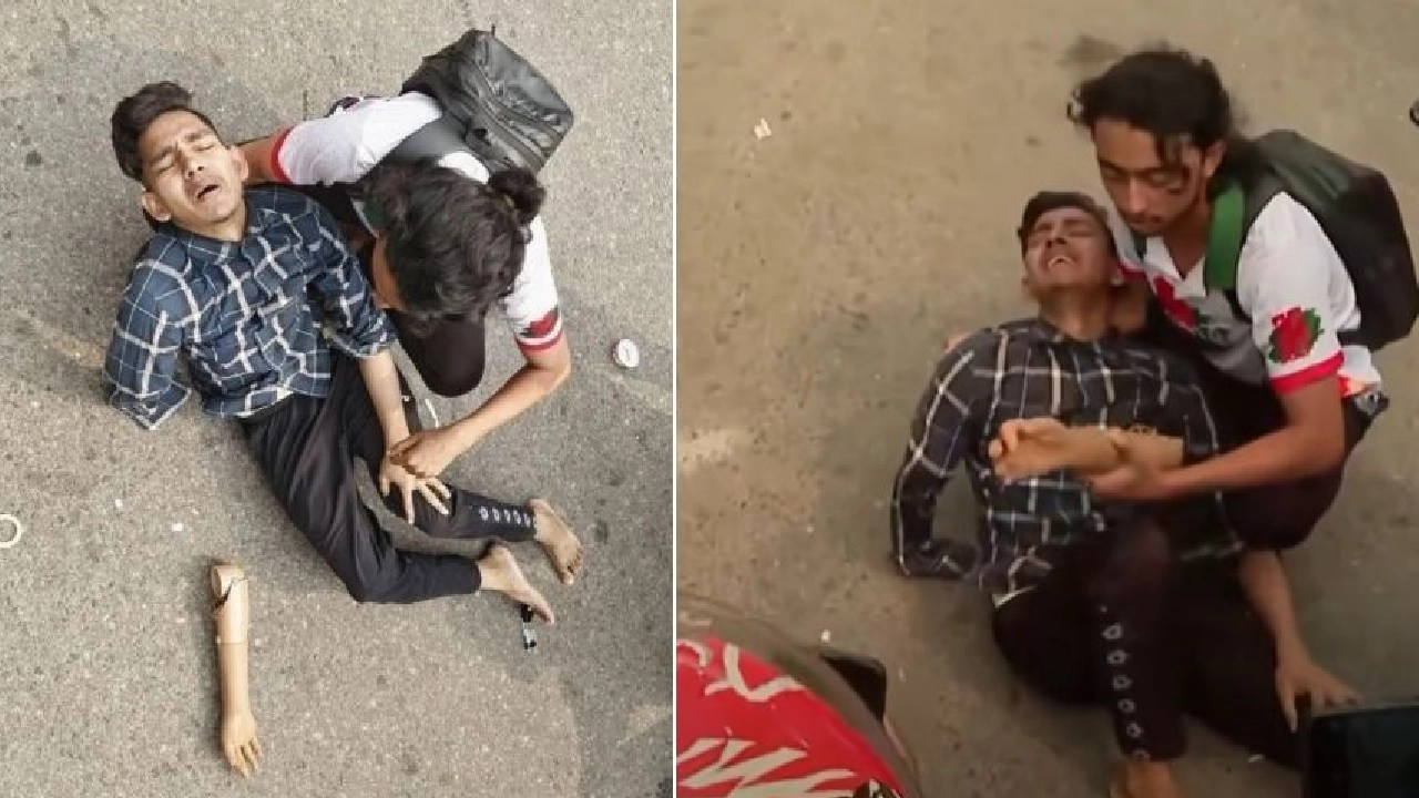 আন্দোলনকারীর শরীর থেকে কৃত্রিম হাত খুলে রাস্তায় পড়ে আছে