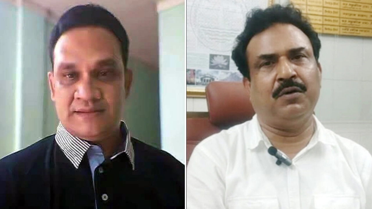 বিএনপি নেতা কামরুল হাসান মাসুদ (বায়ে) ও নির্বাহী প্রকৌশলী জাকির উদ্দিন