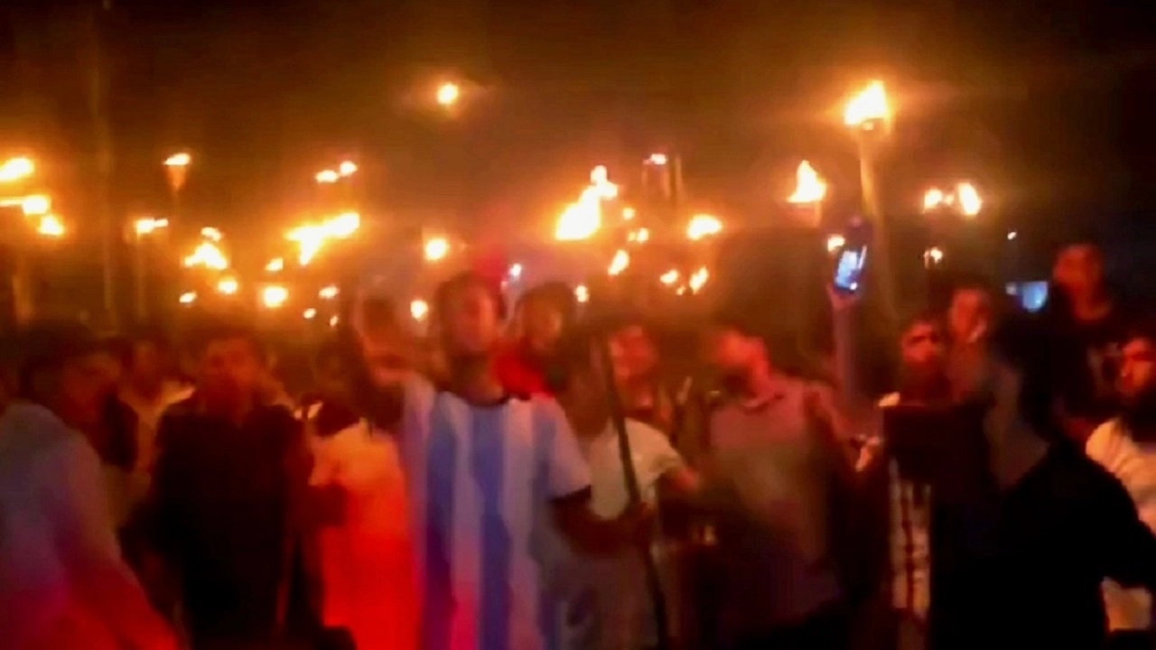 বাজিতপুরে মশাল মিছিল। ছবি: এনপিবি